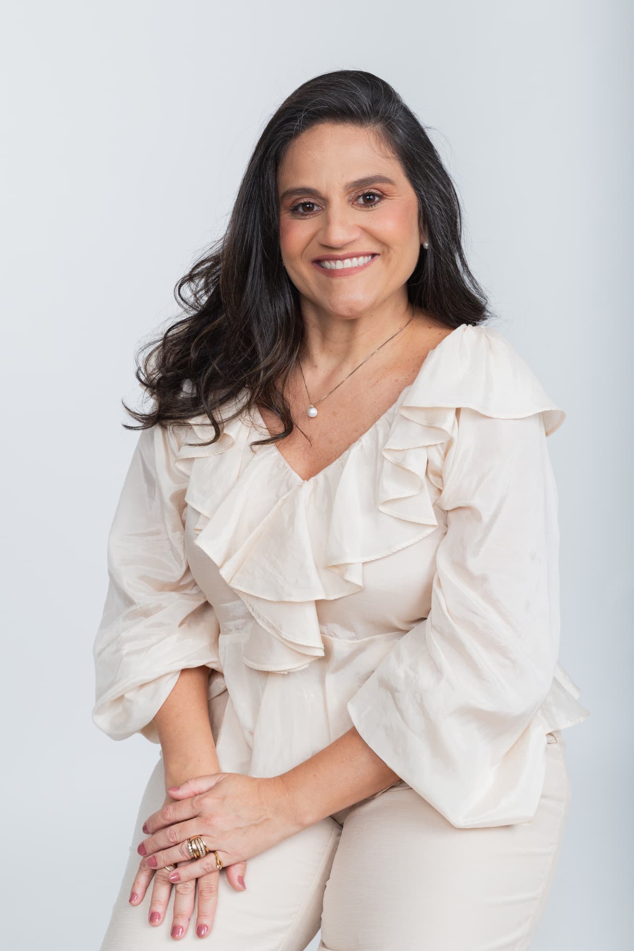 Dra. Christine Gameleira, reumatologista, em retrato profissional